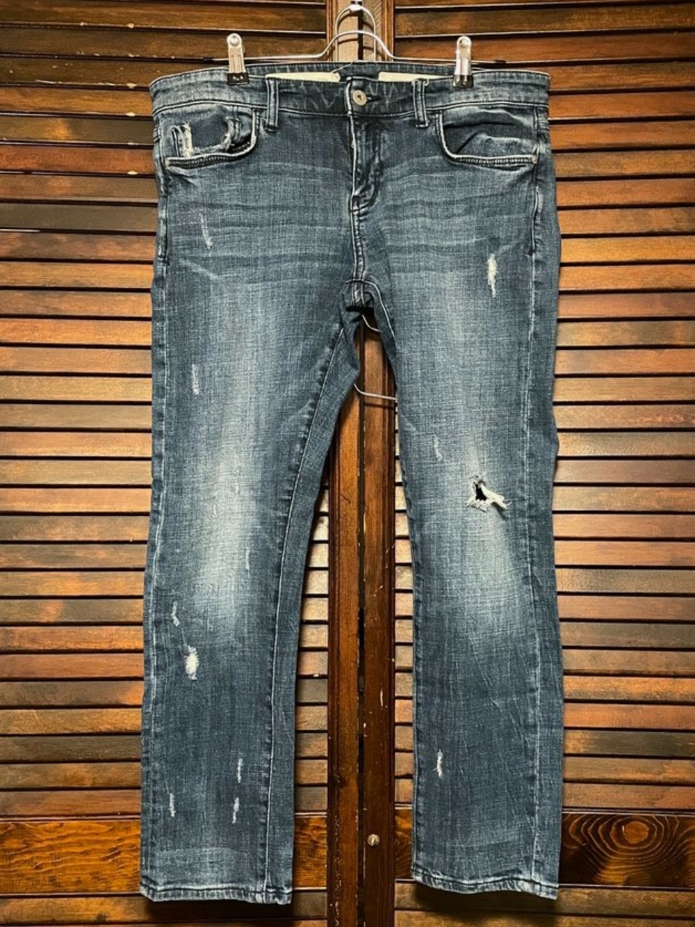 Women's Distressed Mid Wash Blue Jeans